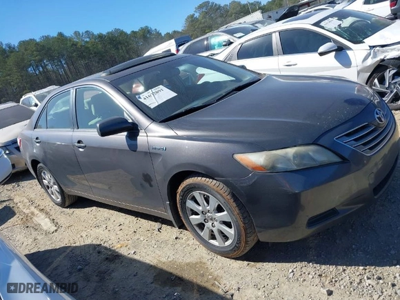 2009 Toyota Camry Hybrid with VIN JTNBB46K893051871, listed as a IAAI auction lot 41672891 with 248,425 mi miles. Bid and sale history available at carsss.com. Image 13.