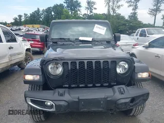 2023 Jeep Gladiator Sport S z VIN 1C6HJTAG3PL521954, wystawiony jako IAAI lot #42502126 z przebiegiem 49 606 mil mil oraz . Historia ofert i sprzedaży dostępna na DreamBid. Obrazek 6.