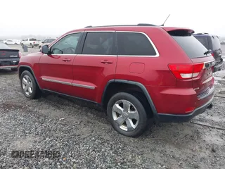 2013 Jeep Grand Cherokee Laredo with VIN 1C4RJEAG0DC516926, listed as a IAAI auction lot 41800254 with 259,006 mi miles. Bid and sale history available at carsss.com. Image 3.