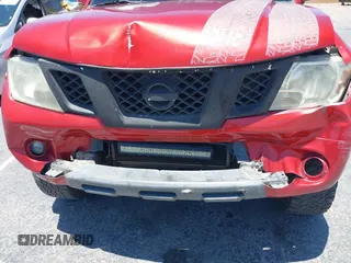 2015 Nissan Frontier SL with VIN 1N6AD0EV1FN711521, listed as a IAAI auction lot 42525352 with 203,114 mi miles and . Bid and sale history available at DreamBid. Image 6.