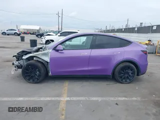 2021 Tesla Model Y Long Range with VIN 5YJYGDEE7MF224531, listed as a IAAI auction lot 38454442 with 52,408 mi miles. Bid and sale history available at carsss.com. Image 15.