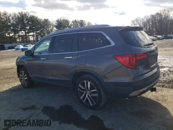 2016 Honda Pilot Touring with VIN 5FNYF6H94GB066943, listed as a Copart auction lot 43064615 with Not Provided miles and Salvage Title. Bid and sale history available at DreamBid. Image 2.