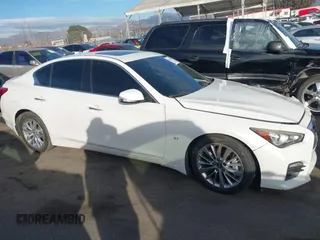 2015 Infiniti Q50 Premium with VIN JN1BV7AP6FM349523, listed as a IAAI auction lot 40940482 with 96,577 mi miles and . Bid and sale history available at DreamBid. Image 13.