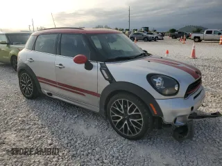 2016 MINI Countryman John Cooper Works with VIN WMWXD1C59GWT97602, listed as a Copart auction lot 52898605 with 141,749 mi miles and Salvage Title. Bid and sale history available at DreamBid. Image 4.