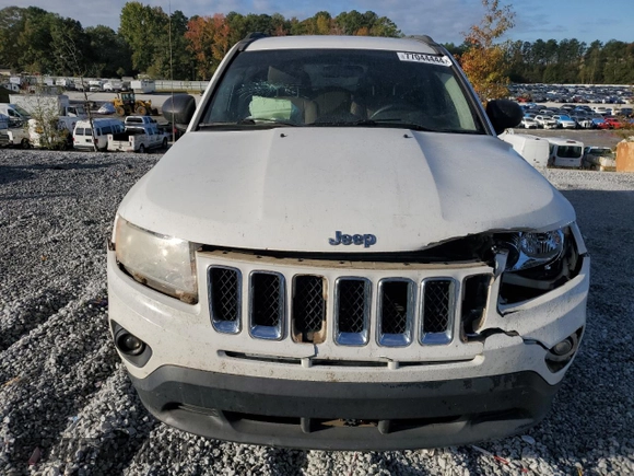 2012 Jeep Compass Latitude with VIN 1C4NJCEA2CD666392, listed as a Copart auction lot 77044444 with 175,283 mi miles and Salvage Title. Bid and sale history available at DreamBid. Image 5.