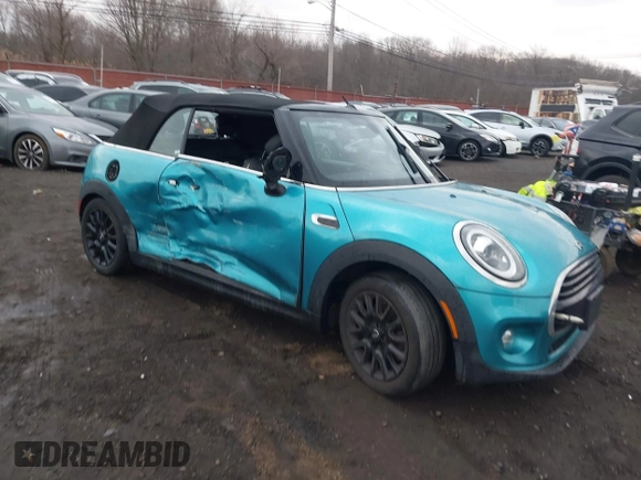 2019 MINI Convertible Cooper with VIN WMWWG5C52K3H08648, listed as a IAAI auction lot 41686314 with 40,728 mi miles and . Bid and sale history available at DreamBid. Image 1.