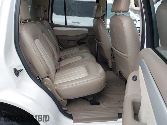 2002 Mercury Mountaineer Convenience z VIN 4M2ZU86W12ZJ35003, wystawiony jako IAAI lot #41193635 z przebiegiem 168 601 mil mil oraz . Historia ofert i sprzedaży dostępna na DreamBid. Obrazek 8.