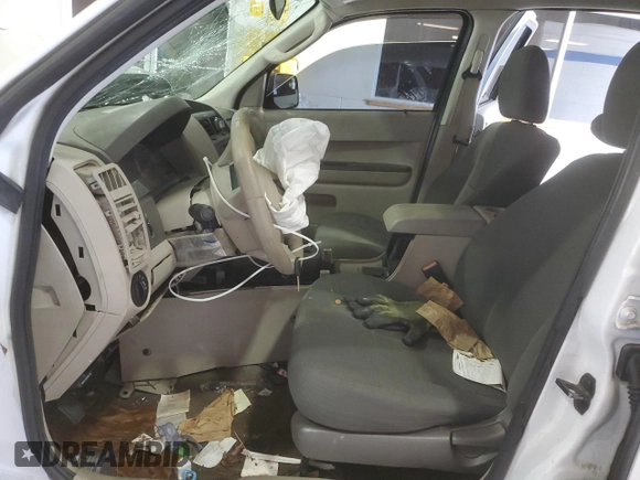 2010 Ford Escape XLS with VIN 1FMCU9C75AKD02318, listed as a Copart auction lot 59130055 with Not provided miles and Salvage title. Bid and sale history available at DreamBid. Image 7.