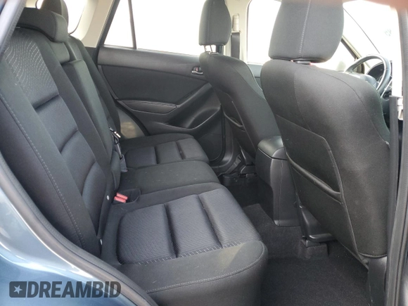 2015 Mazda CX-5 Touring with VIN JM3KE4CY0F0446748, listed as a Copart auction lot 51924585 with 111,402 mi miles and Clean Title. Bid and sale history available at DreamBid. Image 10.