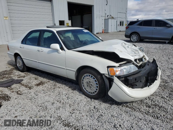 1997 Acura RL Premium Pkg with VIN JH4KA9655VC005115, listed as a Copart auction lot 48745265 with 0 mi miles and Salvage Title. Bid and sale history available at carsss.com. Image 4.