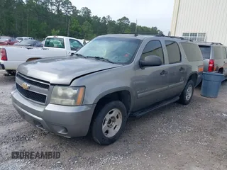 2007 Chevrolet Suburban LT with VIN 1GNFC16077R372737, listed as a IAAI auction lot 41917140 with 249,075 mi miles and . Bid and sale history available at DreamBid. Image 2.