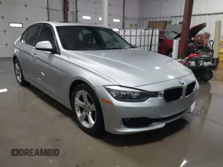 2014 BMW 3 Series 328d xDrive with VIN WBA3D5C55EF147308, listed as a IAAI auction lot 41499435 with 104,941 mi miles. Bid and sale history available at carsss.com. Image 1.