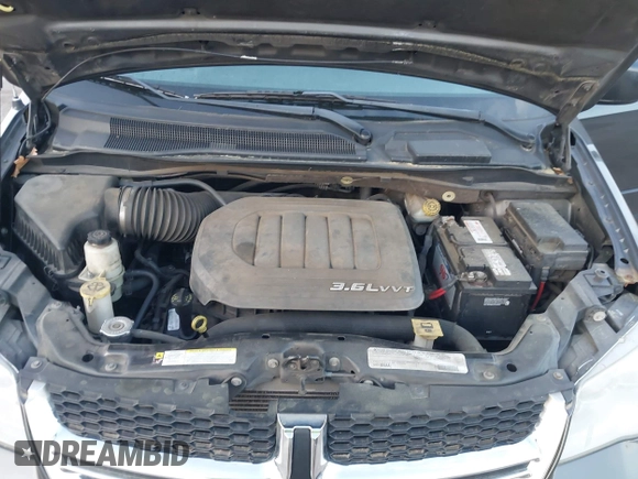 2012 Dodge Grand Caravan SXT with VIN 2C4RDGCG1CR141019, listed as a IAAI auction lot 42088541 with 148,931 mi miles and . Bid and sale history available at DreamBid. Image 10.