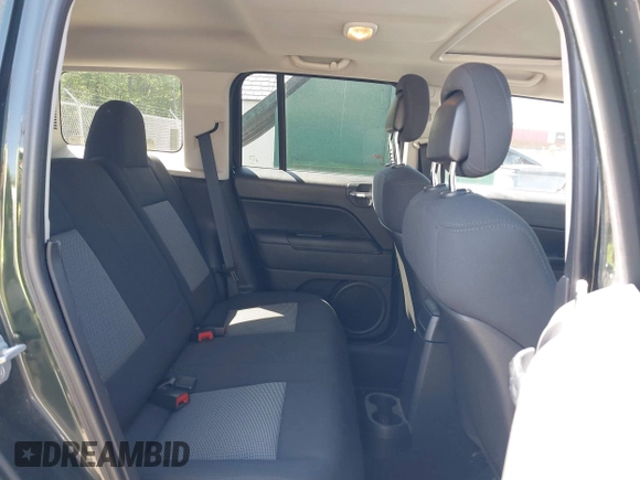 2010 Jeep Patriot Sport with VIN 1J4NF1GB3AD623781, listed as a IAAI auction lot 42053570 with 87,253 mi miles. Bid and sale history available at carsss.com. Image 8.