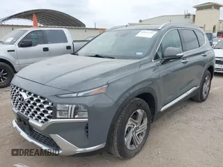 2023 Hyundai Santa Fe SEL z VIN 5NMS34AJ4PH523126, wystawiony jako IAAI lot #42117723 z przebiegiem 61 479 mil mil oraz . Historia ofert i sprzedaży dostępna na DreamBid. Obrazek 2.