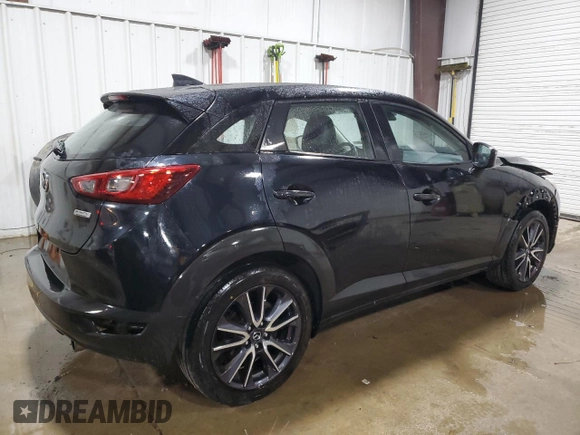 2018 Mazda CX-3 Touring z VIN JM1DKFC75J0301307, wystawiony jako Copart lot #56302175 z przebiegiem 107 676 mil mil oraz Szkoda całkowita • Salvage title. Historia ofert i sprzedaży dostępna na DreamBid. Obrazek 3.