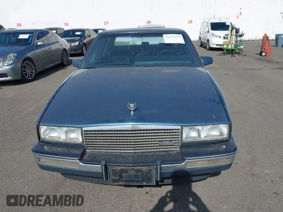 1986 Cadillac Seville z VIN 1G6KS6989GU813079, wystawiony jako IAAI lot #41732353 z przebiegiem Nie podano mil oraz . Historia ofert i sprzedaży dostępna na DreamBid. Obrazek 12.