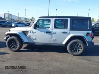2023 Jeep Wrangler Willys with VIN 1C4HJXDG3PW577807, listed as a IAAI auction lot 42323674 with 28,808 mi miles and . Bid and sale history available at DreamBid. Image 14.