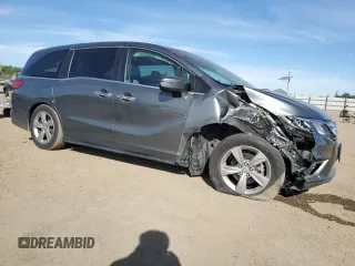 2018 Honda Odyssey EX-L with VIN 5FNRL6H76JB010103, listed as a Copart auction lot 52965965 with 129,837 mi miles and Salvage Title. Bid and sale history available at carsss.com. Image 4.