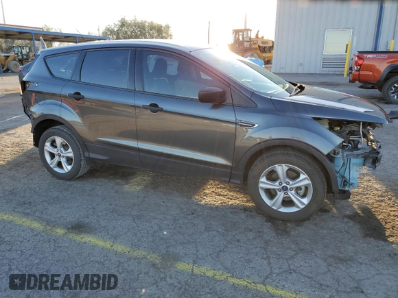 2018 Ford Escape S with VIN 1FMCU0F71JUB44345, listed as a Copart auction lot 47023335 with 40,849 mi miles and Salvage title. Bid and sale history available at DreamBid. Image 4.