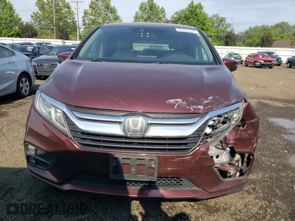 2018 Honda Odyssey EX with VIN 5FNRL6H55JB037386, listed as a Copart auction lot 63577475 with 125,498 mi miles and Salvage title. Bid and sale history available at DreamBid. Image 5.