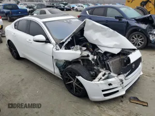 2019 Jaguar XE 25t Premium with VIN SAJAD4FX2KCP54489, listed as a Copart auction lot 85994934 with 79,018 mi miles and Salvage Title. Bid and sale history available at carsss.com. Image 4.