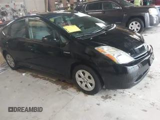 2009 Toyota Prius with VIN JTDKB20U993491553, listed as a IAAI auction lot 42103083 with 166,562 mi miles. Bid and sale history available at carsss.com. Image 1.