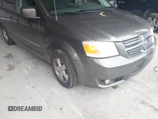 2010 Dodge Grand Caravan SXT z VIN 2D4RN5D11AR220105, wystawiony jako IAAI lot #42299610 z przebiegiem 223 842 mil mil oraz . Historia ofert i sprzedaży dostępna na DreamBid. Obrazek 6.