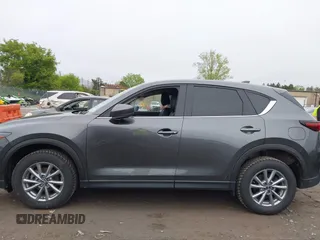2023 Mazda CX-5 S Select with VIN JM3KFBBM4P0228412, listed as a IAAI auction lot 42194856 with 31,708 mi miles and . Bid and sale history available at carsss.com. Image 14.