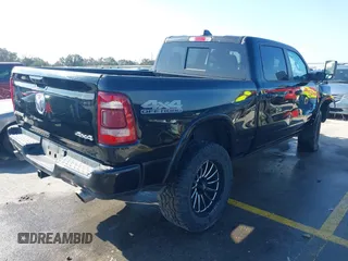 2022 Ram 1500 Laramie with VIN 1C6SRFRT4NN191342, listed as a IAAI auction lot 41483616 with 32,705 mi miles and . Bid and sale history available at DreamBid. Image 4.