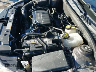 2015 Chevrolet Cruze LT z VIN 1G1PE5SB5F7292331, wystawiony jako IAAI lot #43580996 z przebiegiem 111 503 mil mil oraz . Historia ofert i sprzedaży dostępna na DreamBid. Obrazek 12.