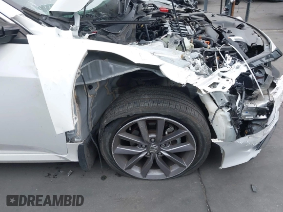 2020 Honda Civic EX-L with VIN 19XFC1F70LE203137, listed as a IAAI auction lot 42028424 with 87,011 mi miles and . Bid and sale history available at DreamBid. Image 12.