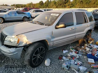 2004 Jeep Grand Cherokee with VIN 1J8GX58J54C284761, listed as a Copart auction lot 75614854 with 182,188 mi miles and Salvage title. Bid and sale history available at DreamBid. Image 1.