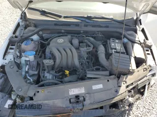 2014 Volkswagen Jetta S with VIN 3VW2K7AJ2EM303673, listed as a Copart auction lot 62909235 with 69,592 mi miles and Salvage title. Bid and sale history available at DreamBid. Image 11.