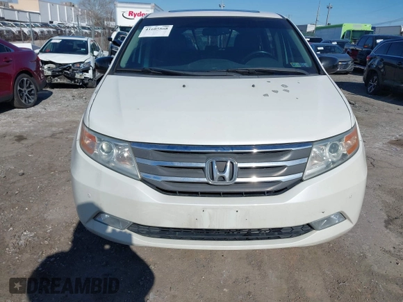 2012 Honda Odyssey Touring with VIN 5FNRL5H96CB010696, listed as a IAAI auction lot 41605868 with 109,411 mi miles and . Bid and sale history available at carsss.com. Image 12.