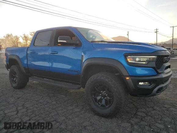 2021 Ram 1500 TRX with VIN 1C6SRFU98MN757772, listed as a Copart auction lot 49923465 with 27,250 mi miles and Salvage Title. Bid and sale history available at carsss.com. Image 4.