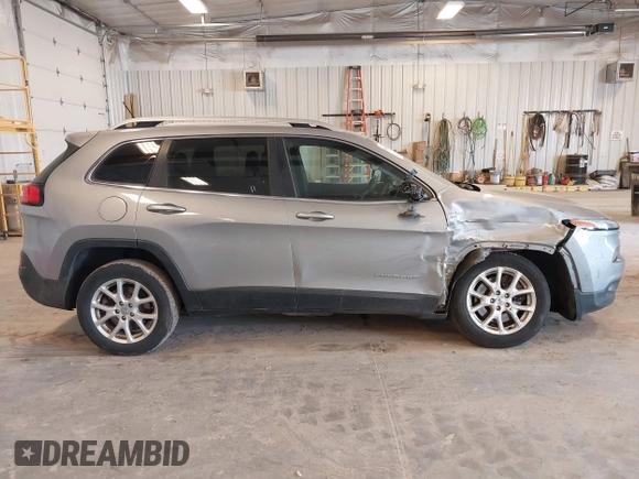 2014 Jeep Cherokee Latitude with VIN 1C4PJLCS1EW106004, listed as a IAAI auction lot 41786457 with 145,588 mi miles. Bid and sale history available at carsss.com. Image 13.