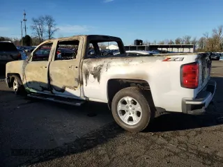2018 Chevrolet Silverado 1500 LT with VIN 1GCUKREC2JF171317, listed as a Copart auction lot 87939215 with Not Provided miles and Salvage Title. Bid and sale history available at DreamBid. Image 2.