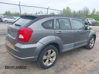 2012 Dodge Caliber SXT with VIN 1C3CDWDA5CD534457, listed as a IAAI auction lot 42197032 with 170,739 mi miles and . Bid and sale history available at DreamBid. Image 4.