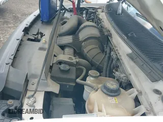 2010 Ford Econoline Cargo Commercial with VIN 1FTNE2EL7ADA74595, listed as a IAAI auction lot 42512878 with 154,412 mi miles and . Bid and sale history available at DreamBid. Image 14.