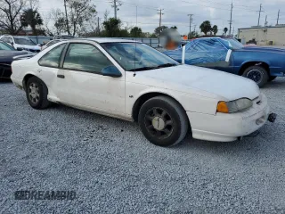 1994 Ford Thunderbird LX with VIN 1FALP62W6RH206764, listed as a Copart auction lot 44213965 with 105,353 mi miles and Salvage Title. Bid and sale history available at DreamBid. Image 4.