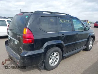 2004 Lexus GX 470 with VIN JTJBT20X640066788, listed as a IAAI auction lot 42247755 with 292,803 mi miles and . Bid and sale history available at DreamBid. Image 4.