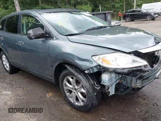 2011 Mazda CX-9 Grand Touring with VIN JM3TB3DV6B0323770, listed as a IAAI auction lot 42767402 with 209,230 mi miles and . Bid and sale history available at DreamBid. Image 1.