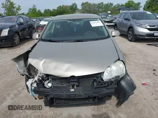 2006 Volkswagen Jetta Value Edition z VIN 3VWPF71K16M760303, wystawiony jako IAAI lot #42352139 z przebiegiem 112 012 mil mil oraz . Historia ofert i sprzedaży dostępna na DreamBid. Obrazek 13.