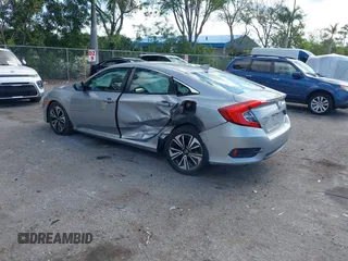2017 Honda Civic EX-T with VIN 19XFC1F39HE001756, listed as a IAAI auction lot 42030331 with 44,056 mi miles. Bid and sale history available at carsss.com. Image 3.