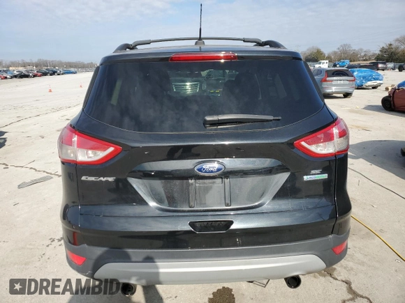 2013 Ford Escape SE with VIN 1FMCU0GX2DUB77759, listed as a Copart auction lot 42611795 with 165,485 mi miles and Salvage Title. Bid and sale history available at DreamBid. Image 6.