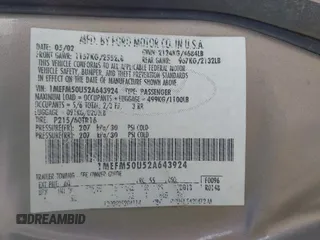 2002 Mercury Sable GS z VIN 1MEFM50U52A643924, wystawiony jako IAAI lot #41900910 z przebiegiem 150 413 mil mil oraz . Historia ofert i sprzedaży dostępna na DreamBid. Obrazek 9.