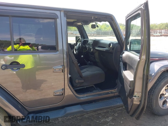 2016 Jeep Wrangler Unlimited Sahara with VIN 1C4BJWEG7GL340074, listed as a IAAI auction lot 42434763 with 81,095 mi miles and . Bid and sale history available at DreamBid. Image 5.