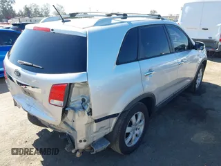 2013 Kia Sorento LX with VIN 5XYKT4A6XDG356336, listed as a IAAI auction lot 42503679 with 236,752 mi miles and . Bid and sale history available at DreamBid. Image 4.