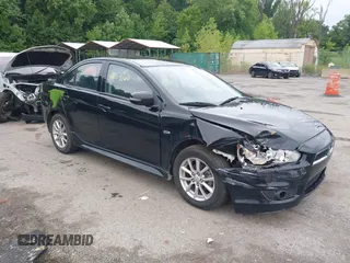 2015 Mitsubishi Lancer ES with VIN JA32U2FU9FU002350, listed as a IAAI auction lot 40054160 with 120,980 mi miles. Bid and sale history available at carsss.com. Image 1.